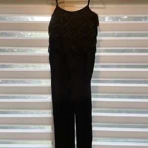 BCBG Maxazria romper In black. NEW WITH TAGS